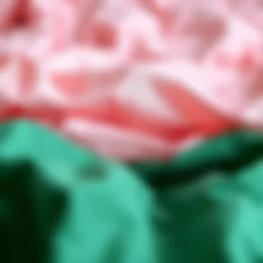 Close-Up of Bed Sheet Fabrics Close-up of fabric textures showcasing pink and green bed sheets