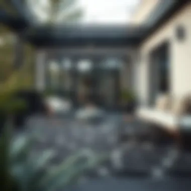 Elegant black and grey outdoor rug on a patio