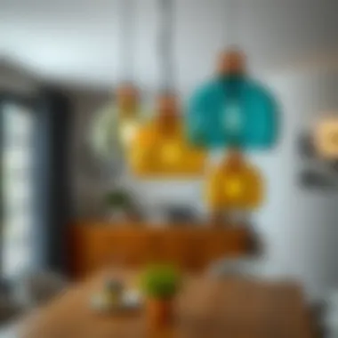 Stylish colored glass pendant lights over a dining table