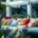 Colorful assortment of patio pillows arranged on a stylish outdoor sofa