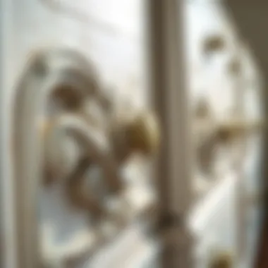 Close-up of intricate carvings on a rustic white chest of drawers