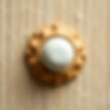 Artisanal Ceramic Pull Artisanal ceramic cabinet pull against a textured background