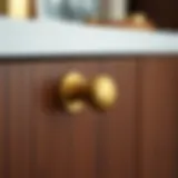 Sophisticated Brass Pull Elegant brass cabinet pull on a wooden cabinet