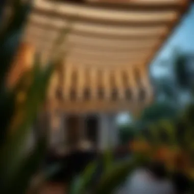 Seamless Installation of Striped Awnings Installation of a black and white striped retractable awning on a patio