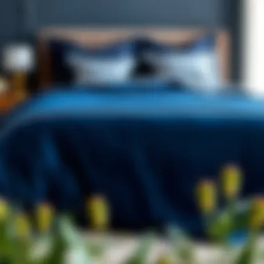 Elegant navy blue duvet cover on a queen-sized bed with decorative pillows