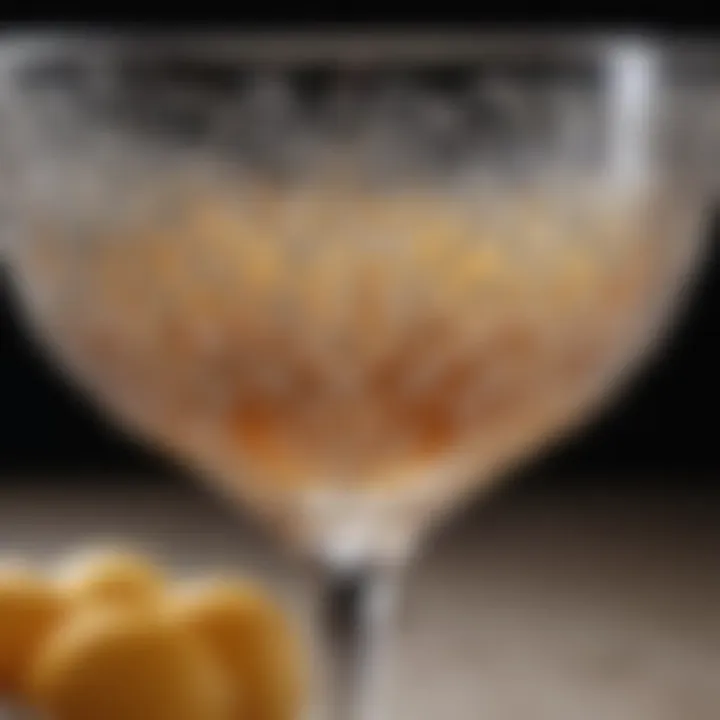 Close-up of intricate designs on a vintage coupe champagne glass