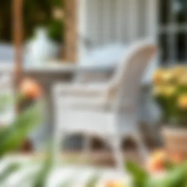 Close-up of white wicker dining chairs on a patio