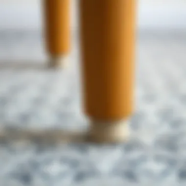 Close-up of felt pad installation on a furniture leg