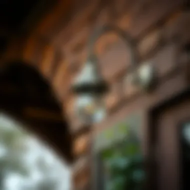 Gooseneck Lighting on Rustic Architecture Stylish gooseneck light mounted on a rustic building