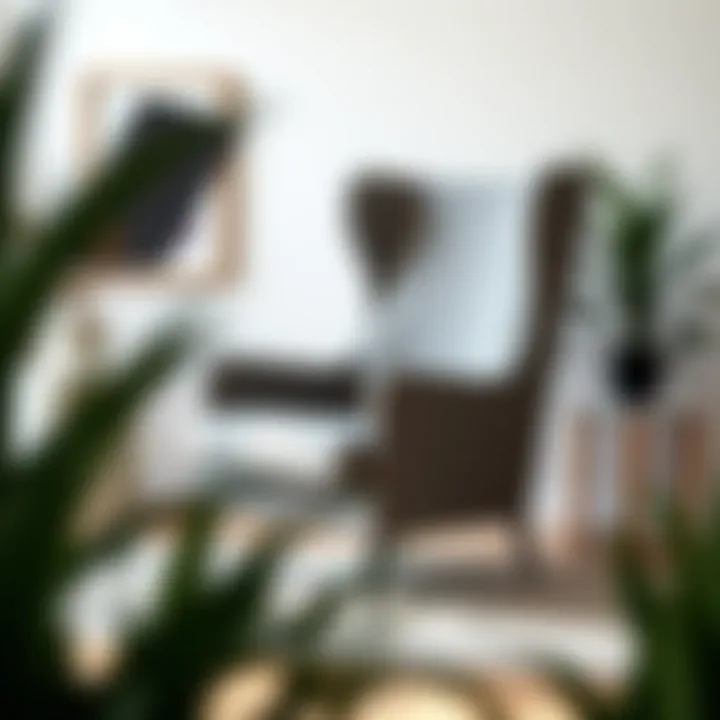 Contemporary grey wingback chair surrounded by minimalist decor