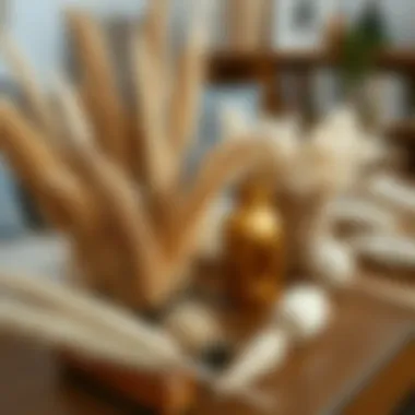 Textured display of various dried grasses on a wooden table