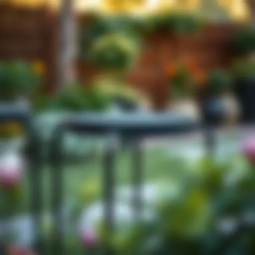 Stylish black metal patio end table in a garden setting