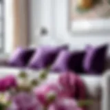 A beautifully arranged purple throw pillow set on a stylish sofa