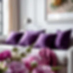 A beautifully arranged purple throw pillow set on a stylish sofa