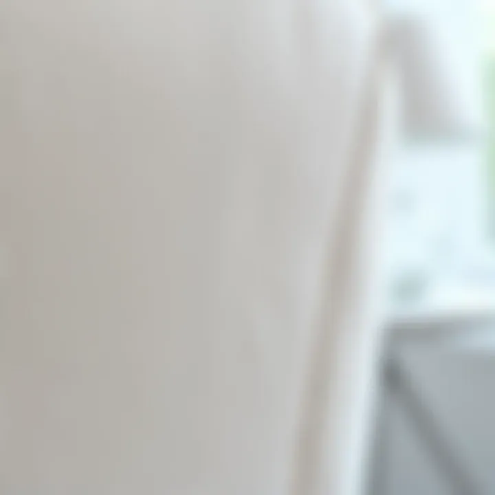 Close-up of white sofa chair fabric showing texture